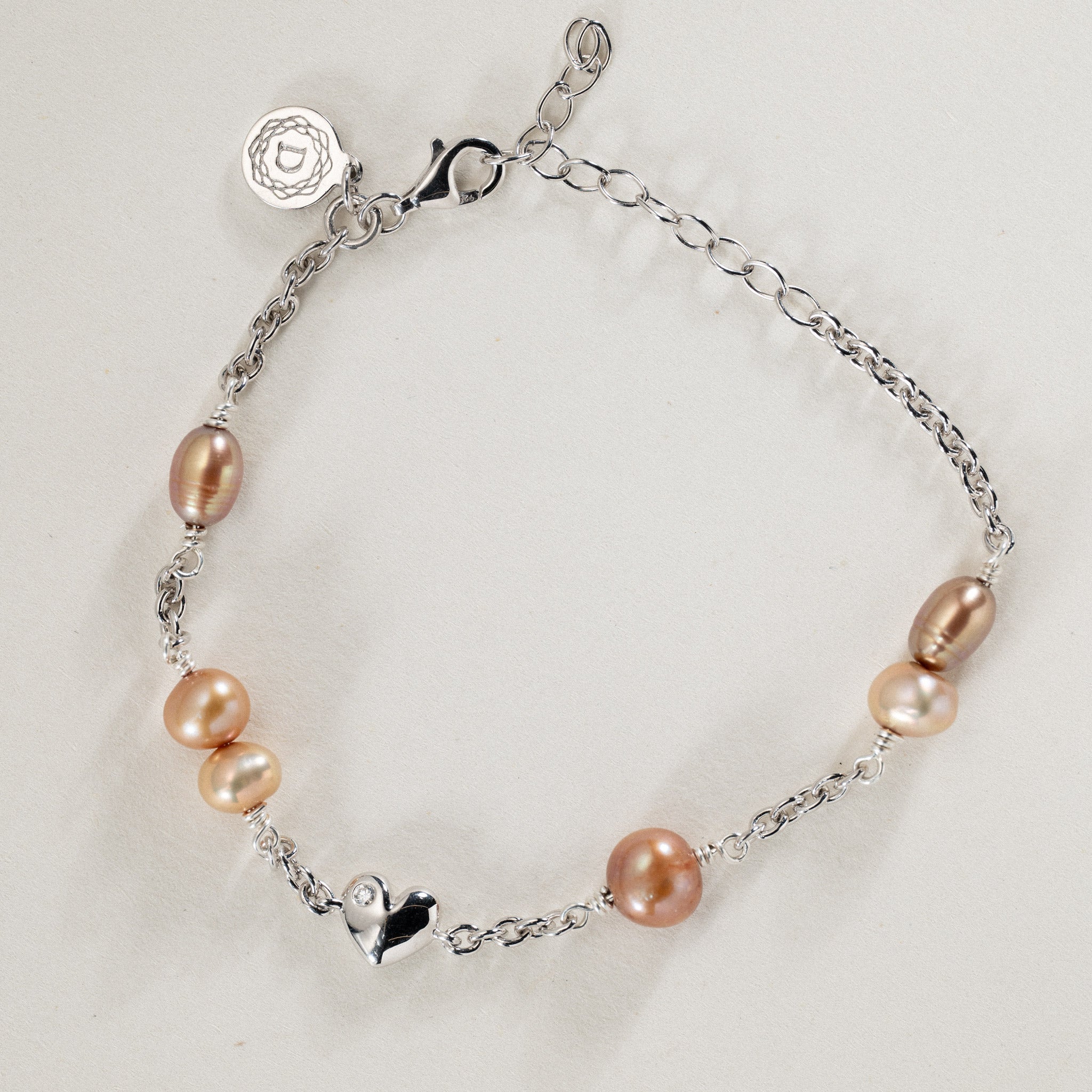 No. 02 - 0.02ct Grown Diamond Twised heart bracelet in silver w. freshwater pearls