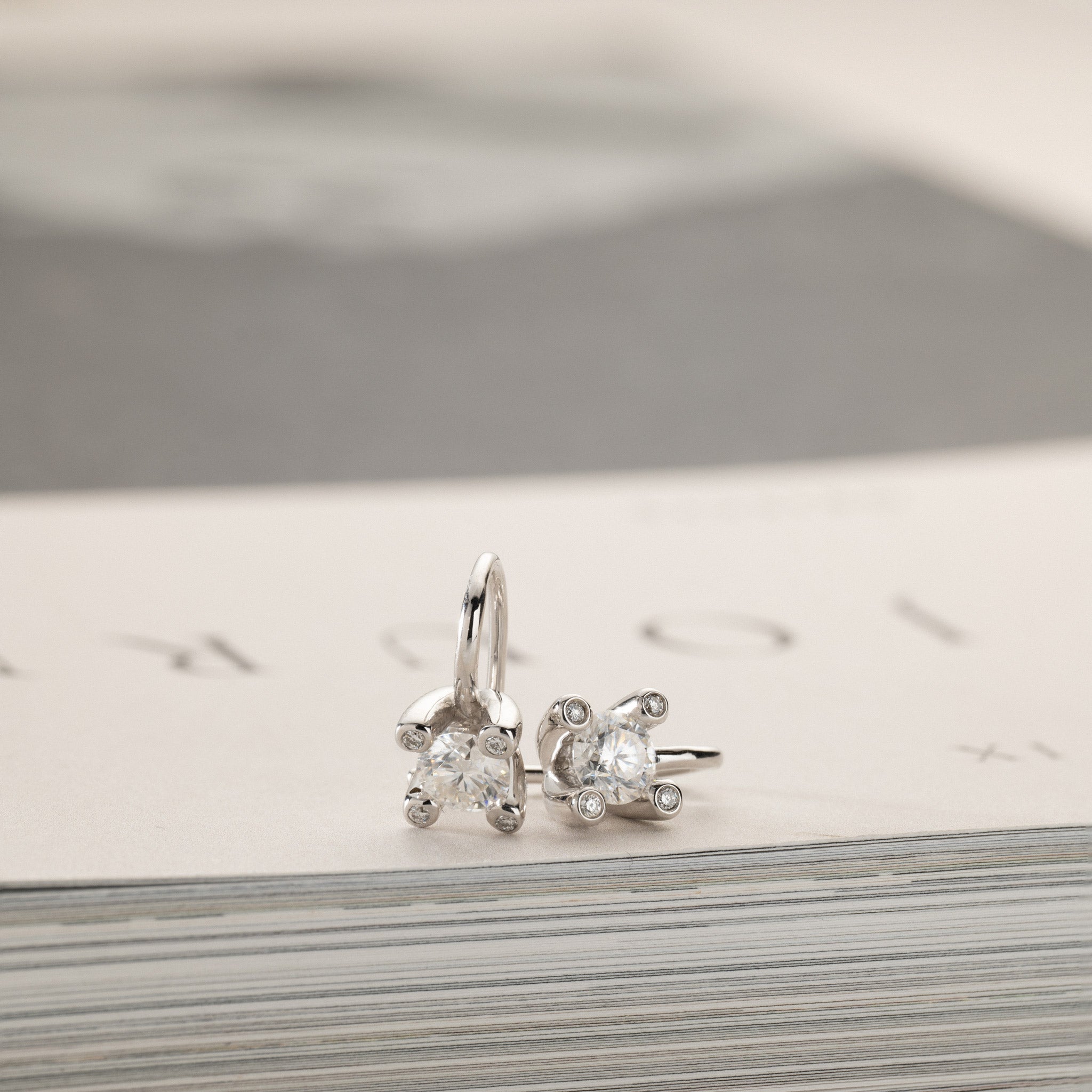 Miriam – solitaire earrings 2x0.50ct Moissanite & diamonds in crown silver