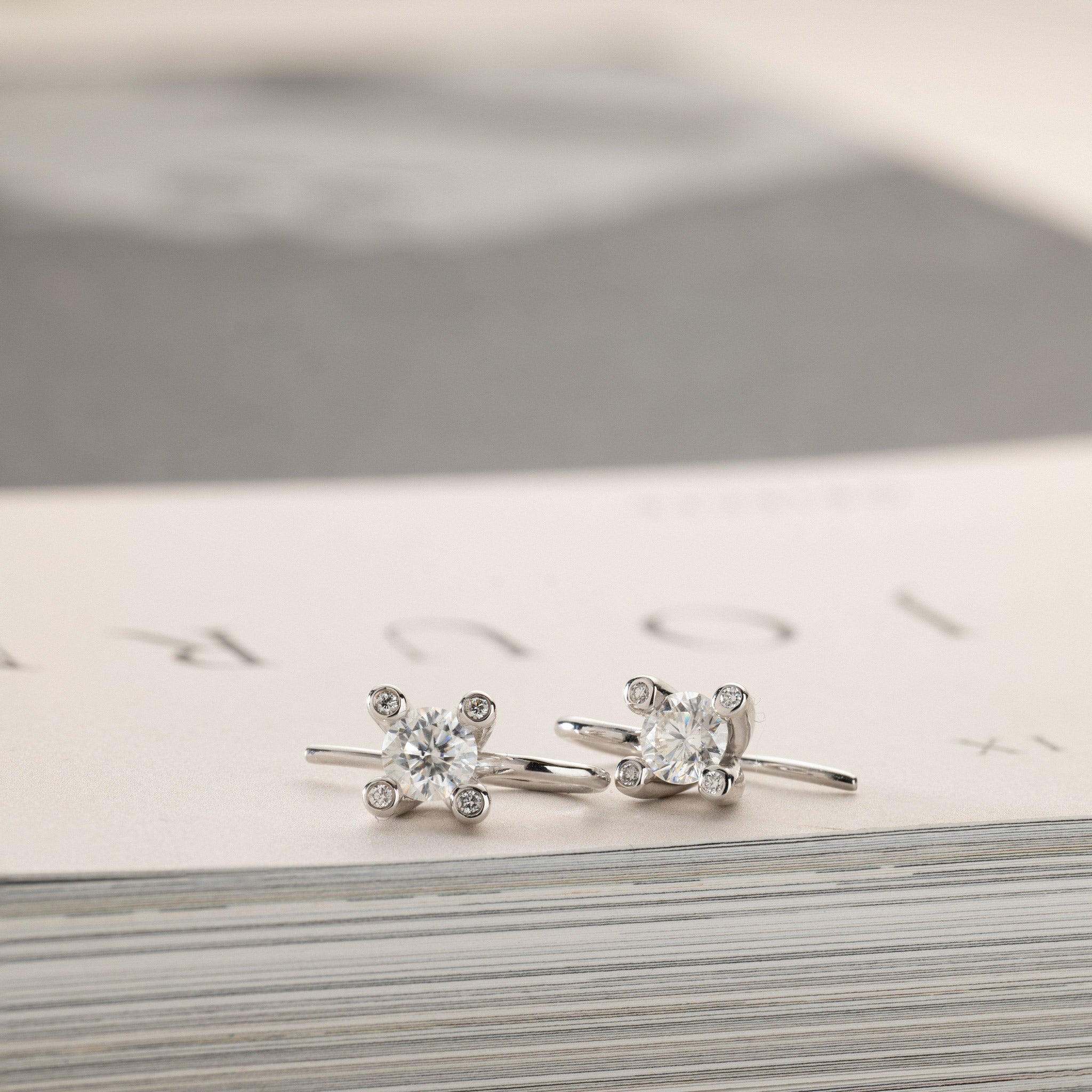 Miriam – solitaire earrings 2x0.50ct Moissanite & diamonds in crown silver