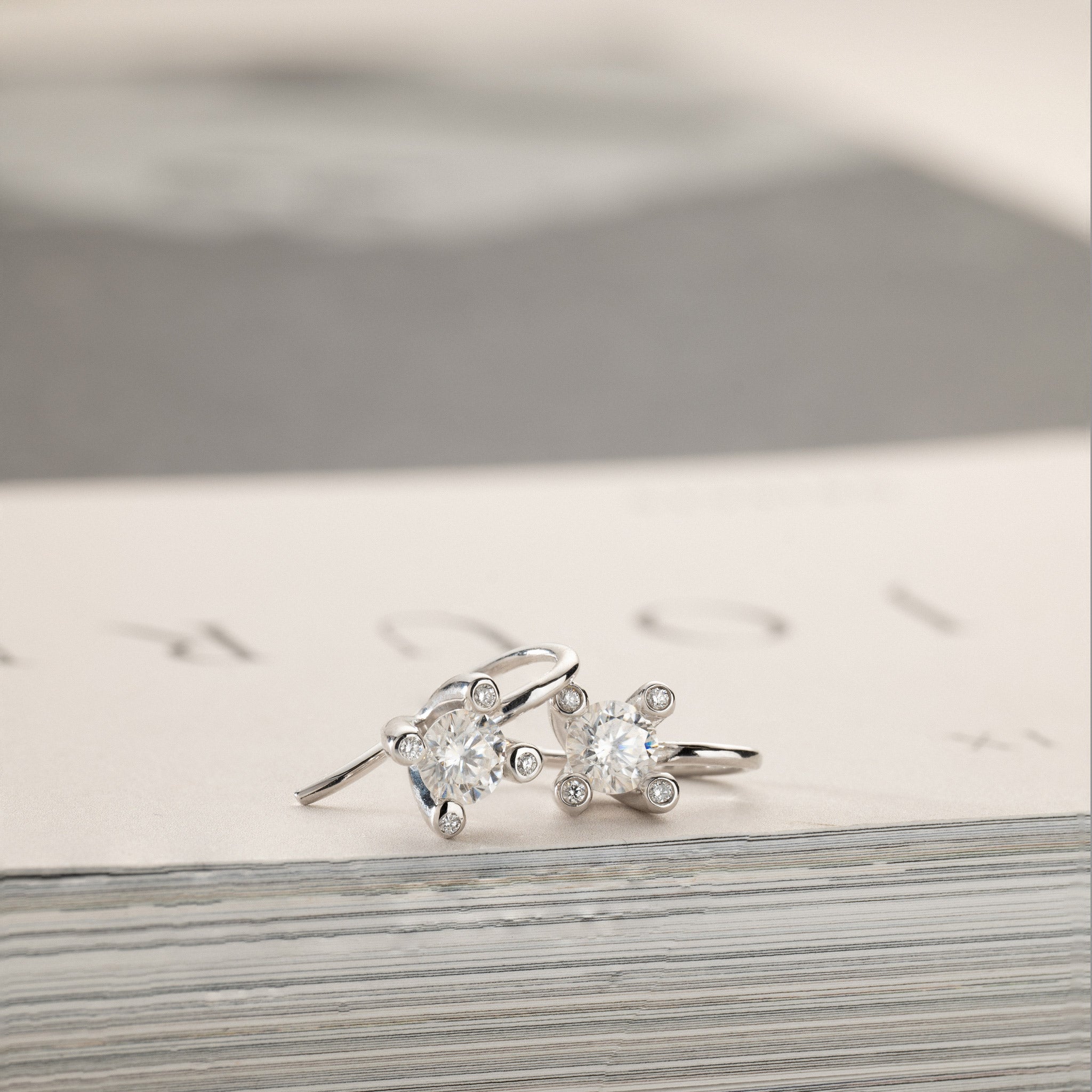 Miriam – solitaire earrings 2x0.50ct Moissanite & diamonds in crown silver