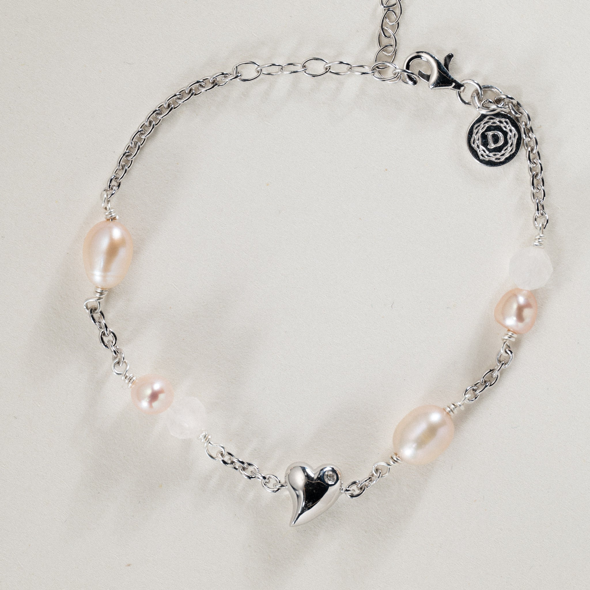 No. 08 - 0.02ct Grown Diamond Twisted heart bracelet in silver w. freshwater pearls
