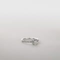 Clara – 1.0 ct Moissanite Four-Prong Solitaire Ring Lab-Grown Diamonds Pavé Band Silver
