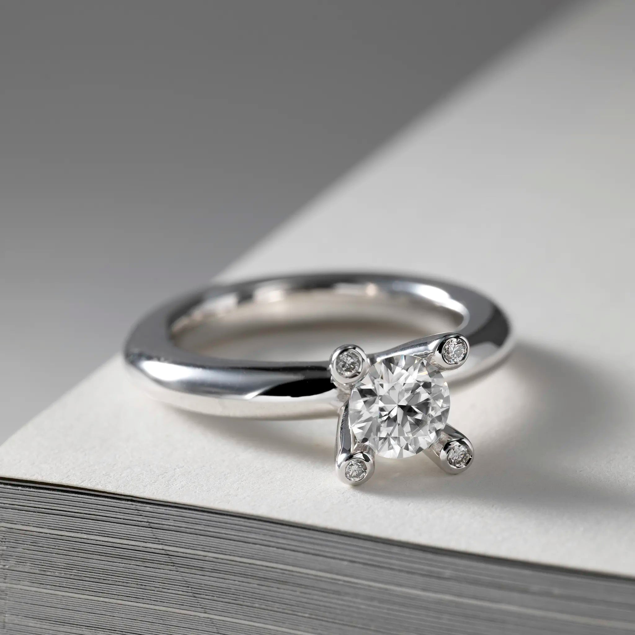 Miriam solitaire ring 0.75ct Moissanite & diamonds in crown silver with texture