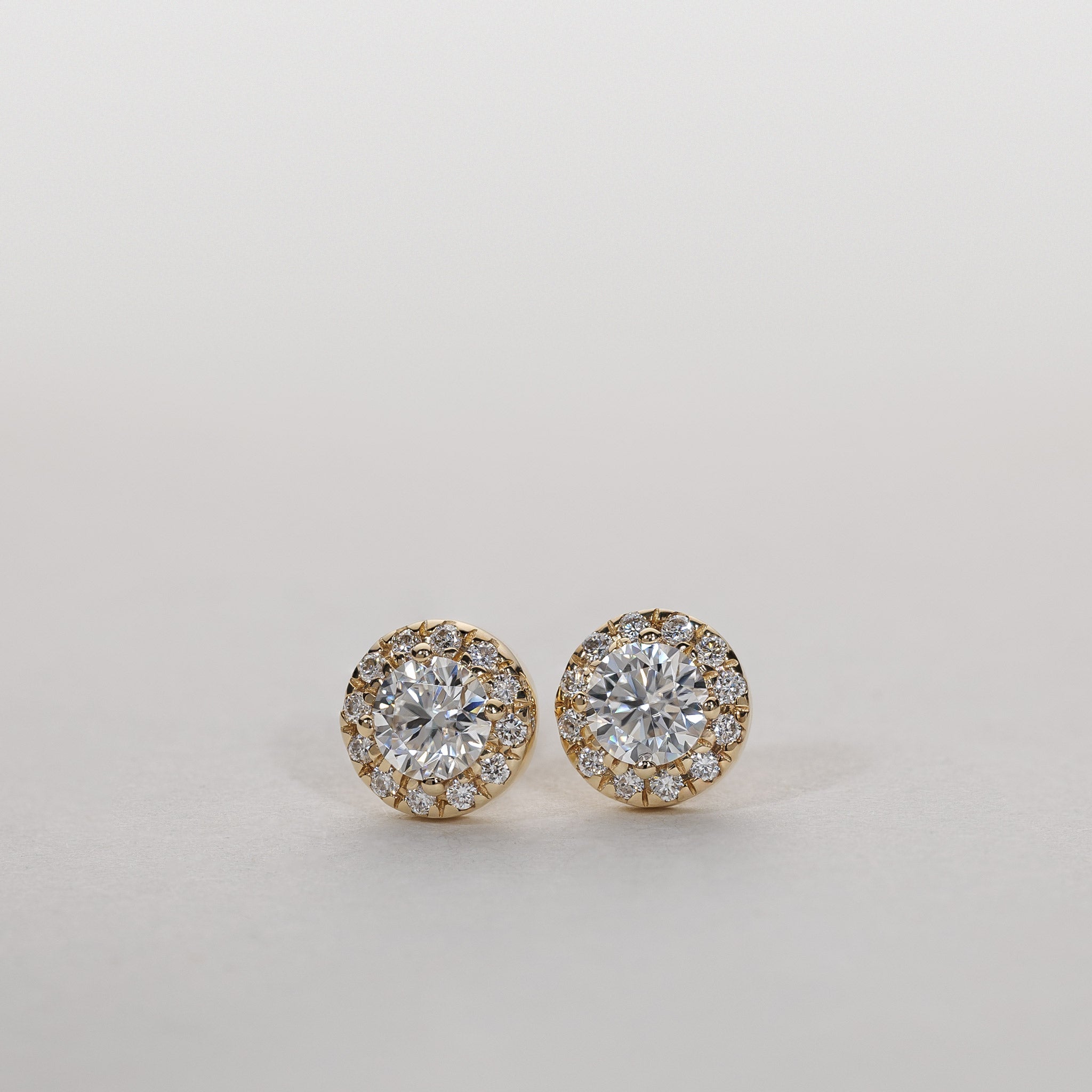 1.0ct lab grown Diamond halo stud earrings 14K gold clara