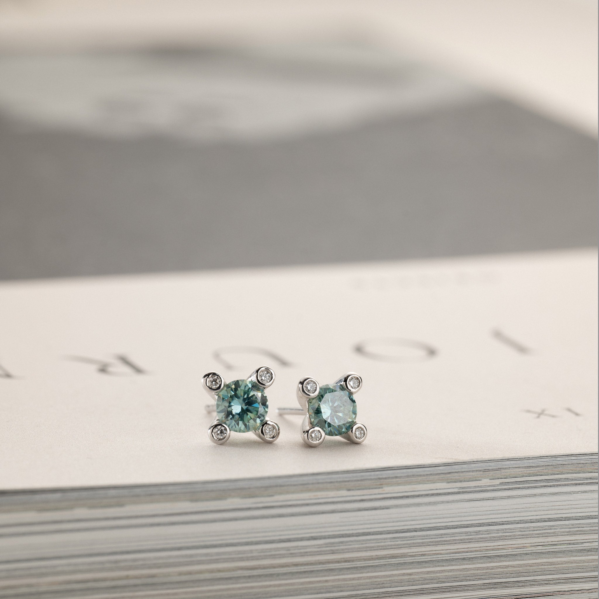2x0.50ct Laguna green moissanite solitaire stud earrings silver diamonds in crown Miriam