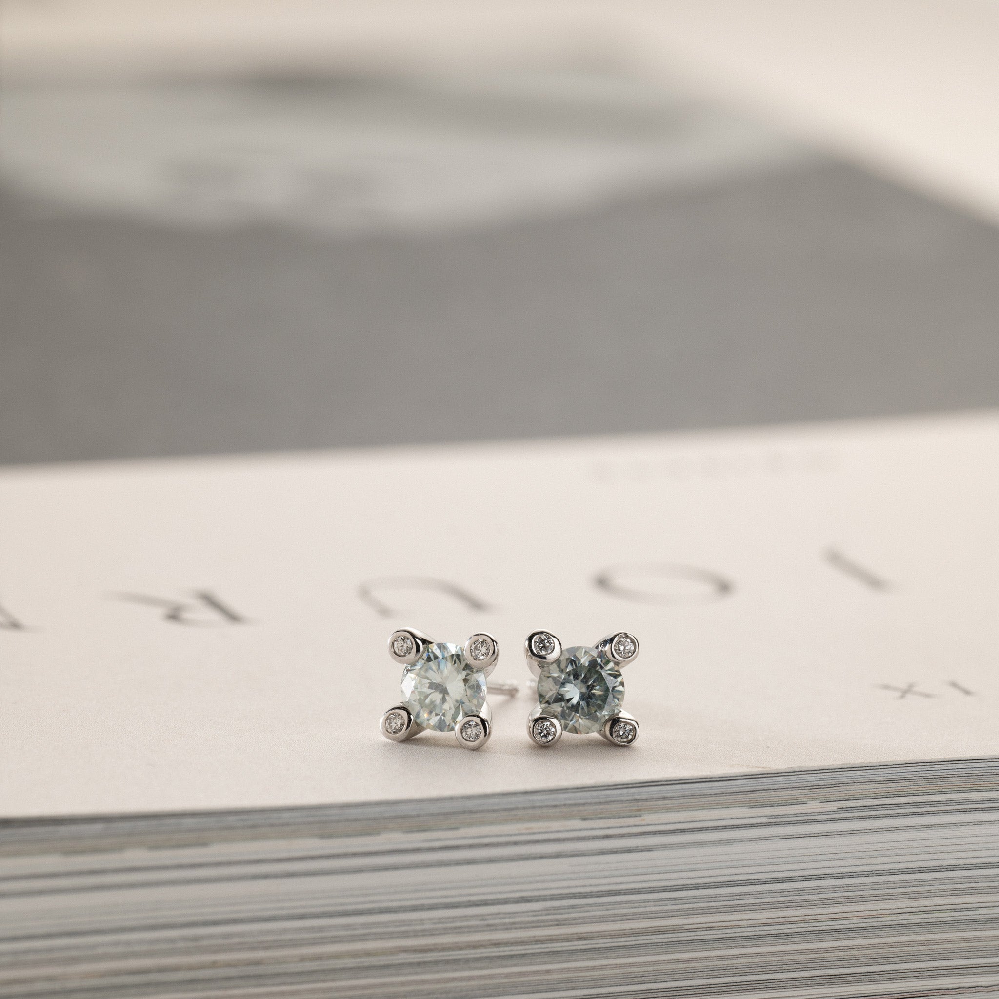 Miriam solitaire stud earrings 2x0.50ct light green moissanite & diamonds in crown silver