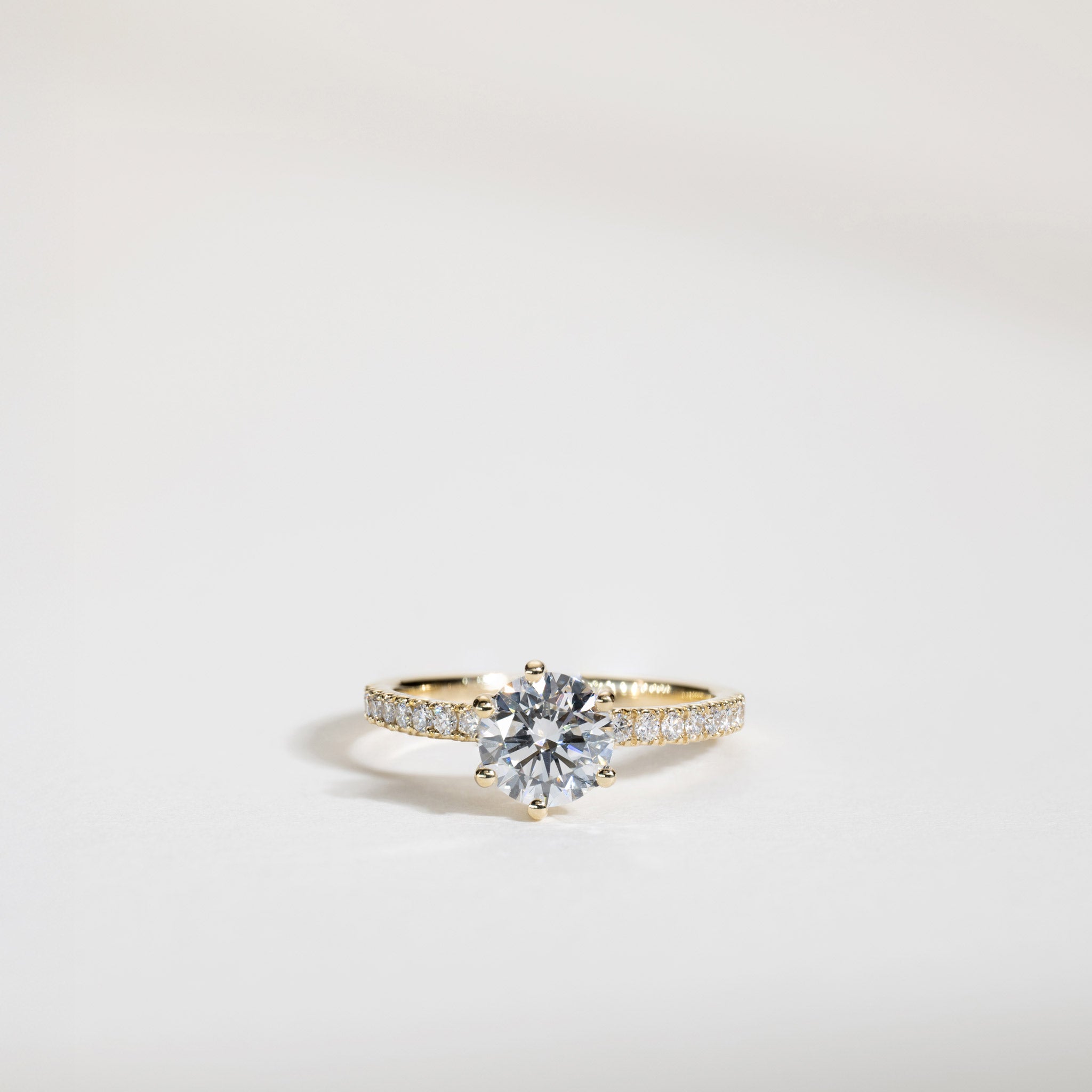 Clara Lab-Grown Diamond Six-Prong Solitaire Ring with Pavé-Set Band – 14K Gold